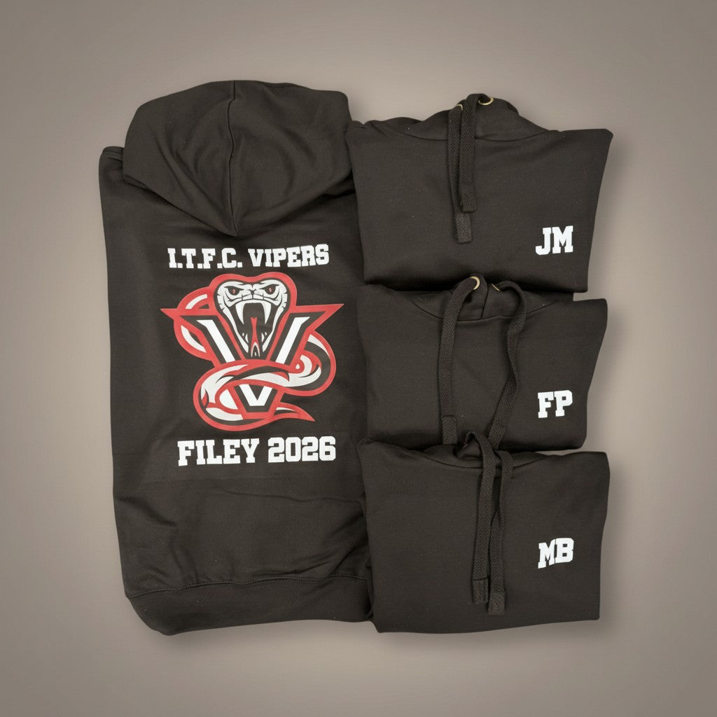 Black team hoodies with personalized text and logos on a grey background